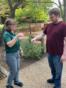 man with bird on hand at a bird show